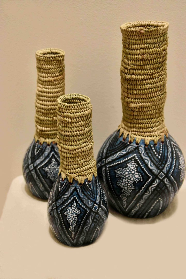 Ceramics and weaving dark blue white vases